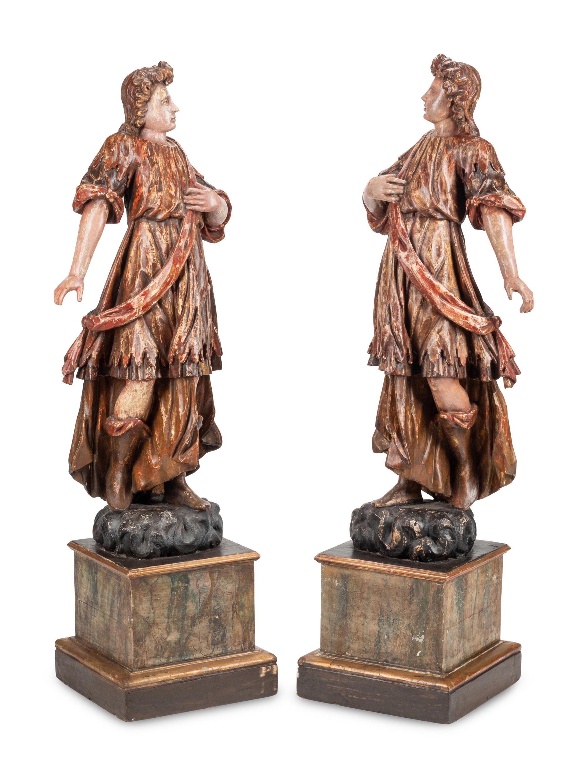 A Pair of Large Continental Painted Figures of Saints