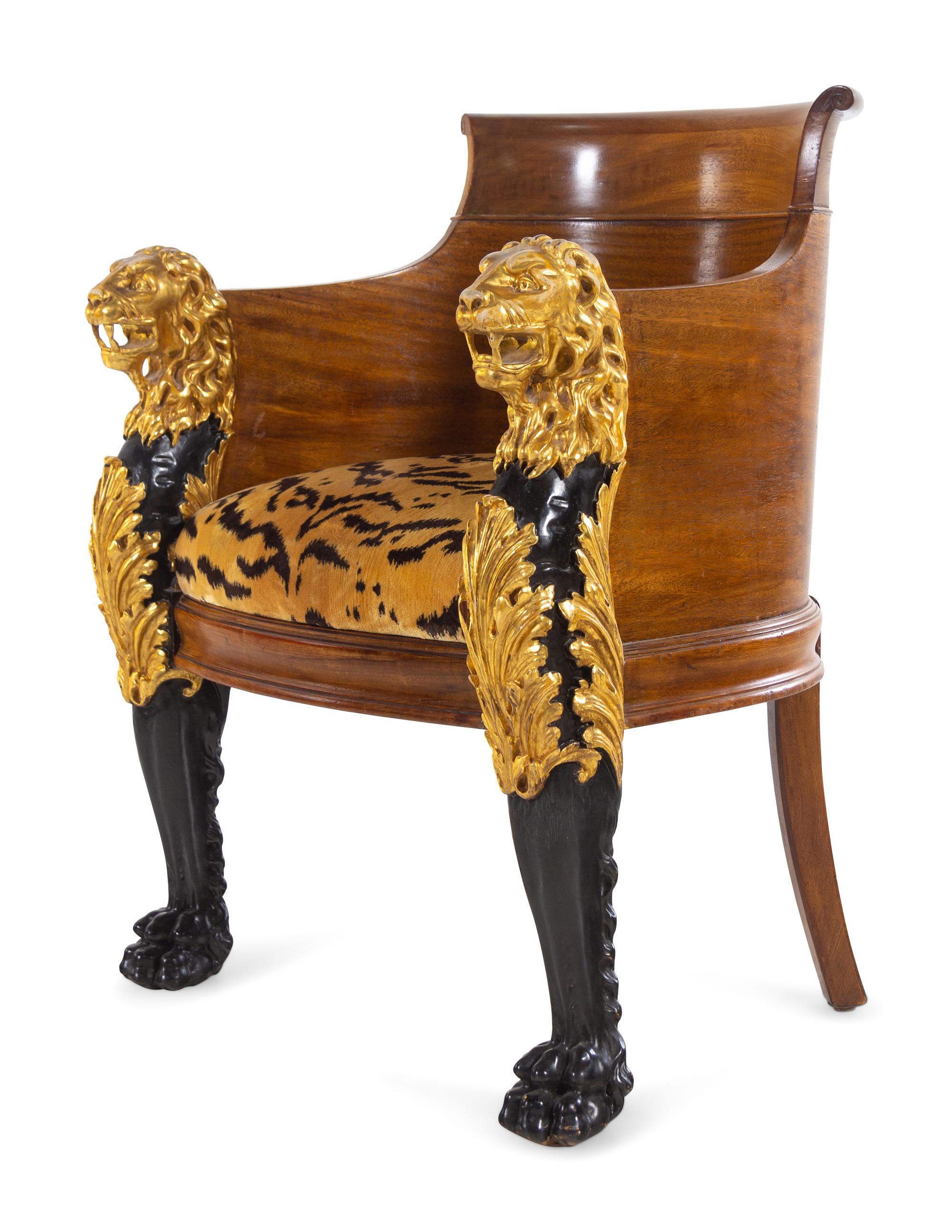 An Italian Empire Style Parcel Gilt Mahogany Armchair