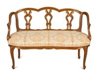 A Continental Painted and Giltwood Settee
