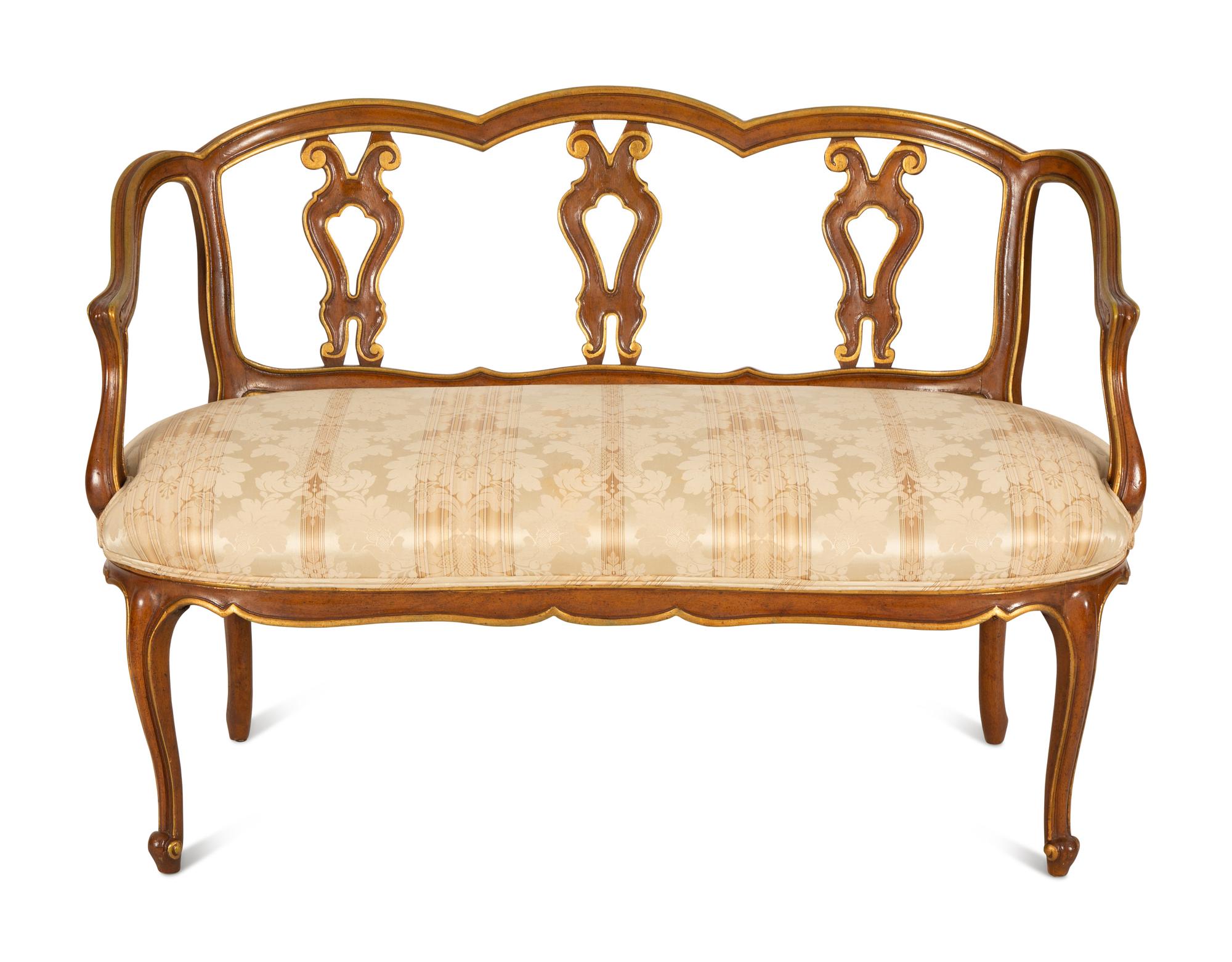 A Continental Painted and Giltwood Settee