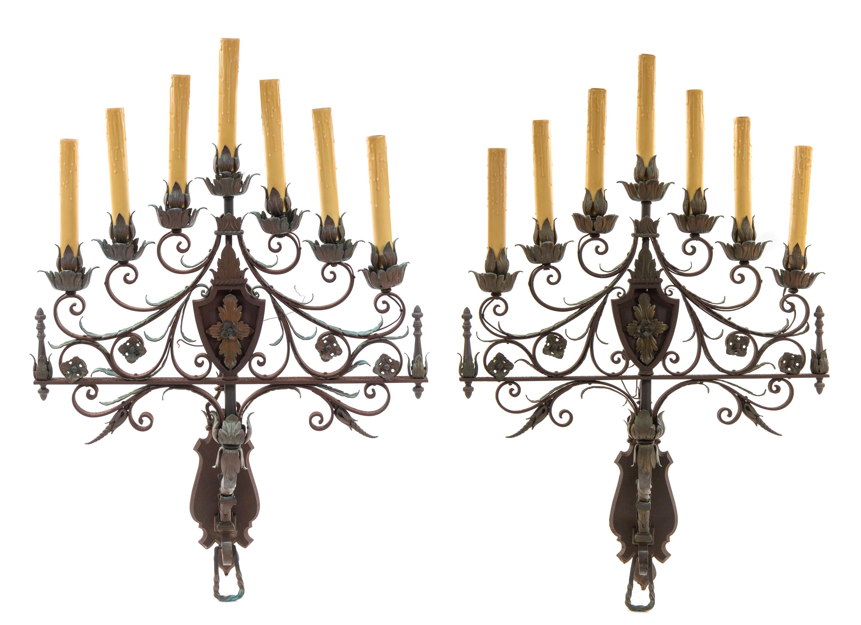 A Pair of Wrought Iron Seven-Light Sconces Height 34 x width 31 inches. — STYLE OF ADDISON MIZNER, EARLY 20TH CENTURY