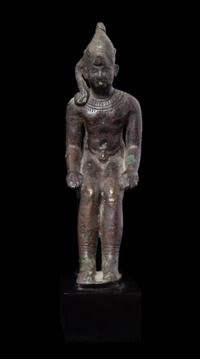 An Egyptian Bronze Seated Harpokrates Height 4 1/4 inches. — LATE PERIOD, DYNASTY 26-30, 664-343 B.C.E.