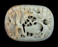 A Carved Celadon Jade 'Carp and Lotus' Plaque