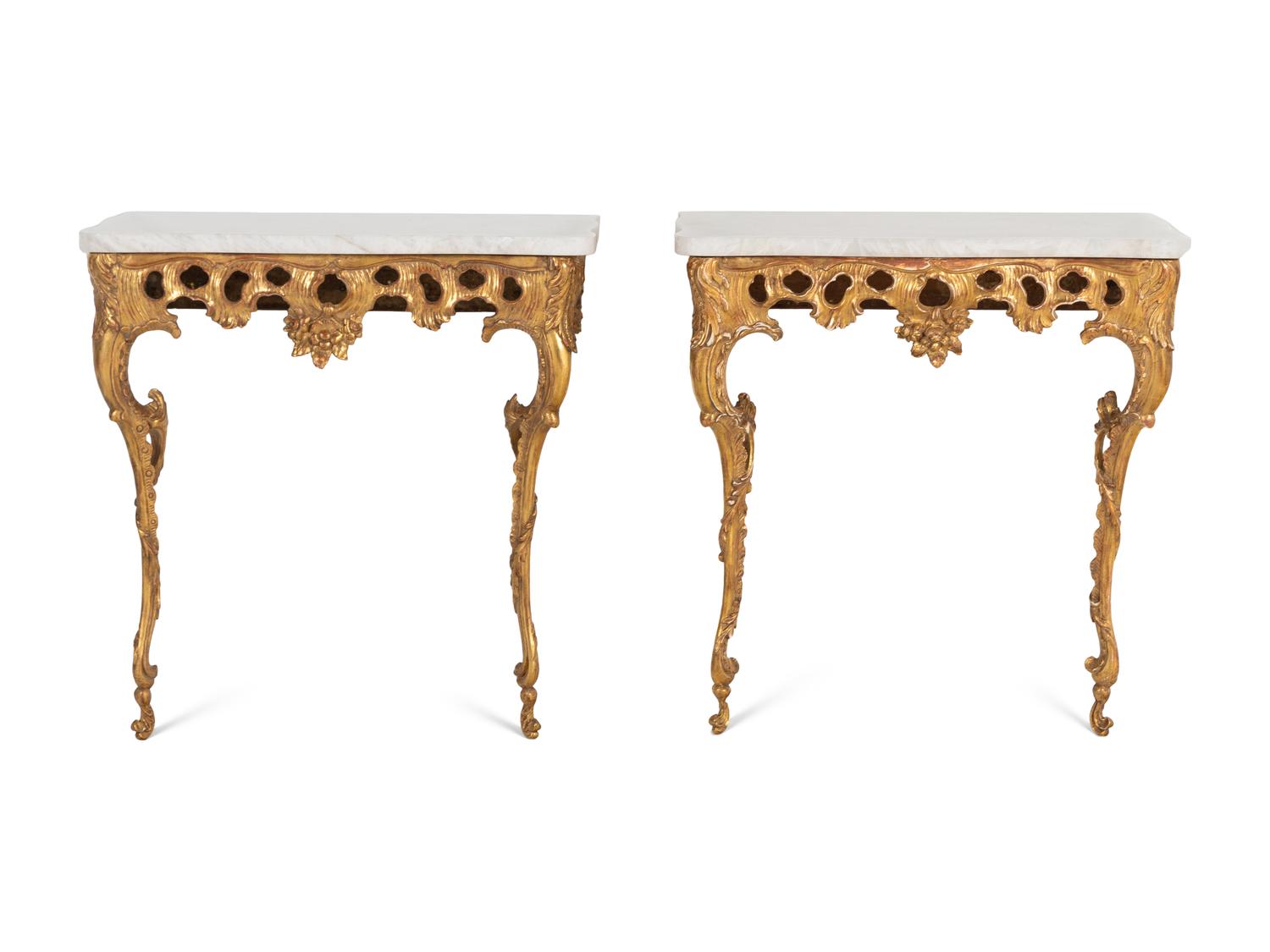 A Pair of North European Rococo Giltwood Marble-Top Console Tables