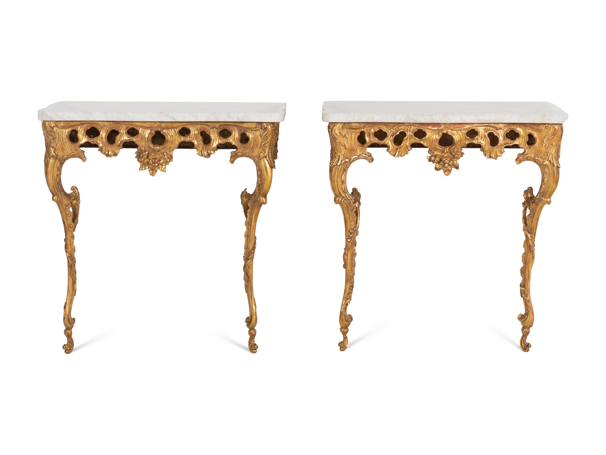 A Pair of North European Rococo Giltwood Marble-Top Console Tables