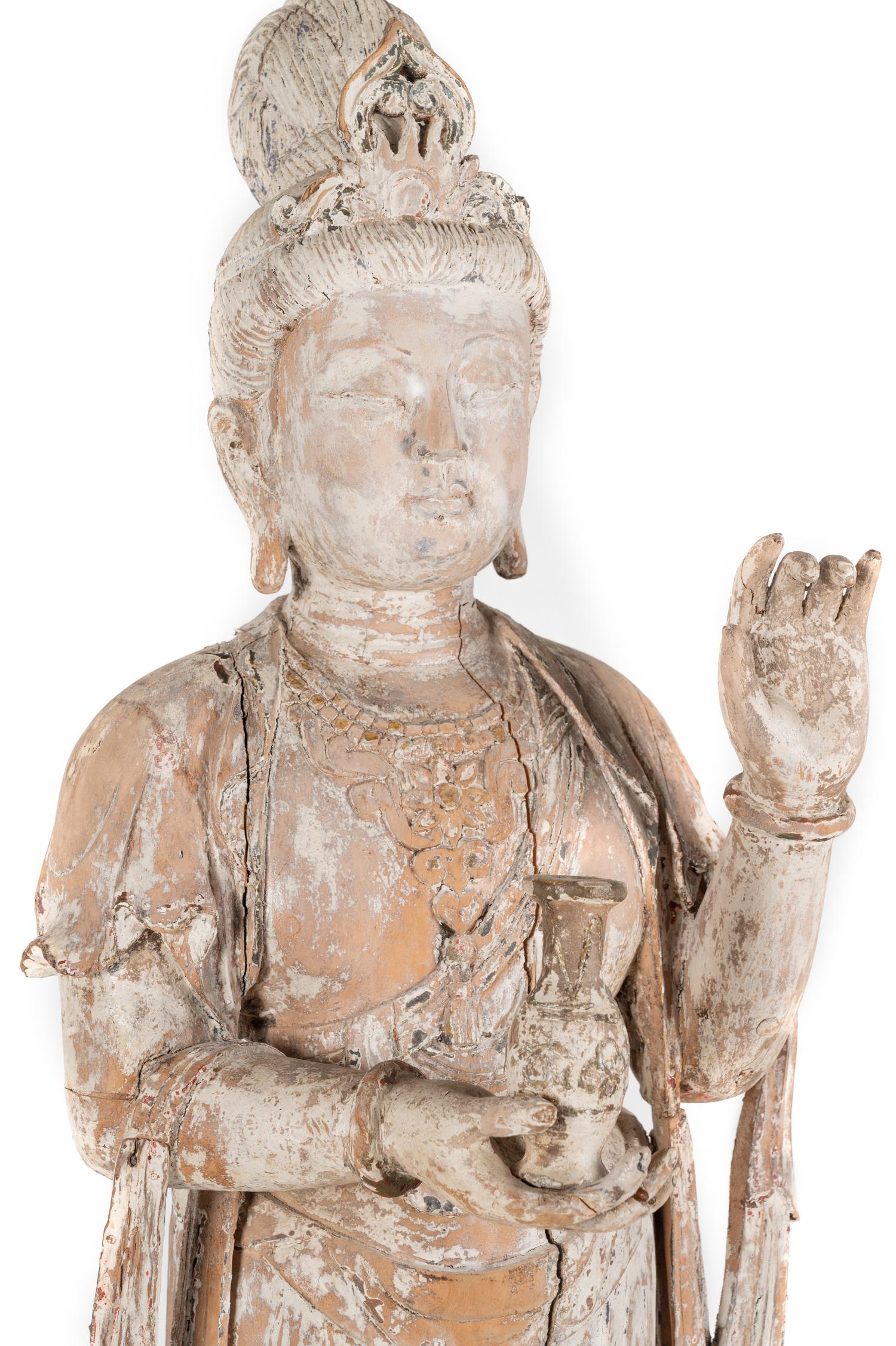A Chinese Carved Wood Figure of Standing Guanyin