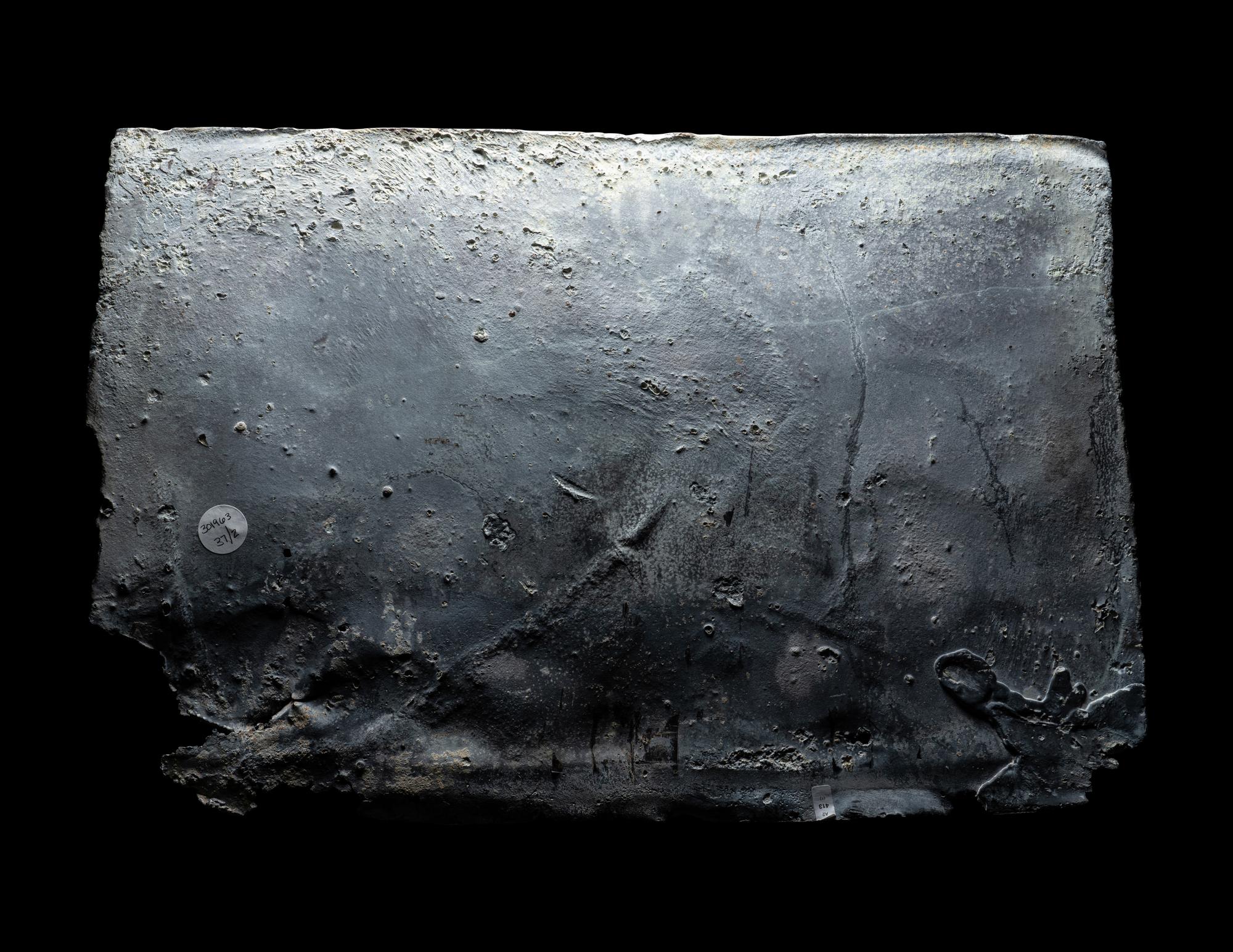 Two Roman Lead Sarcophagus Fragments