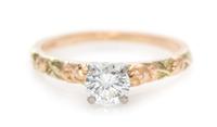 A 14 Rose Gold and Diamond Solitaire Ring, 1.40 dwts.