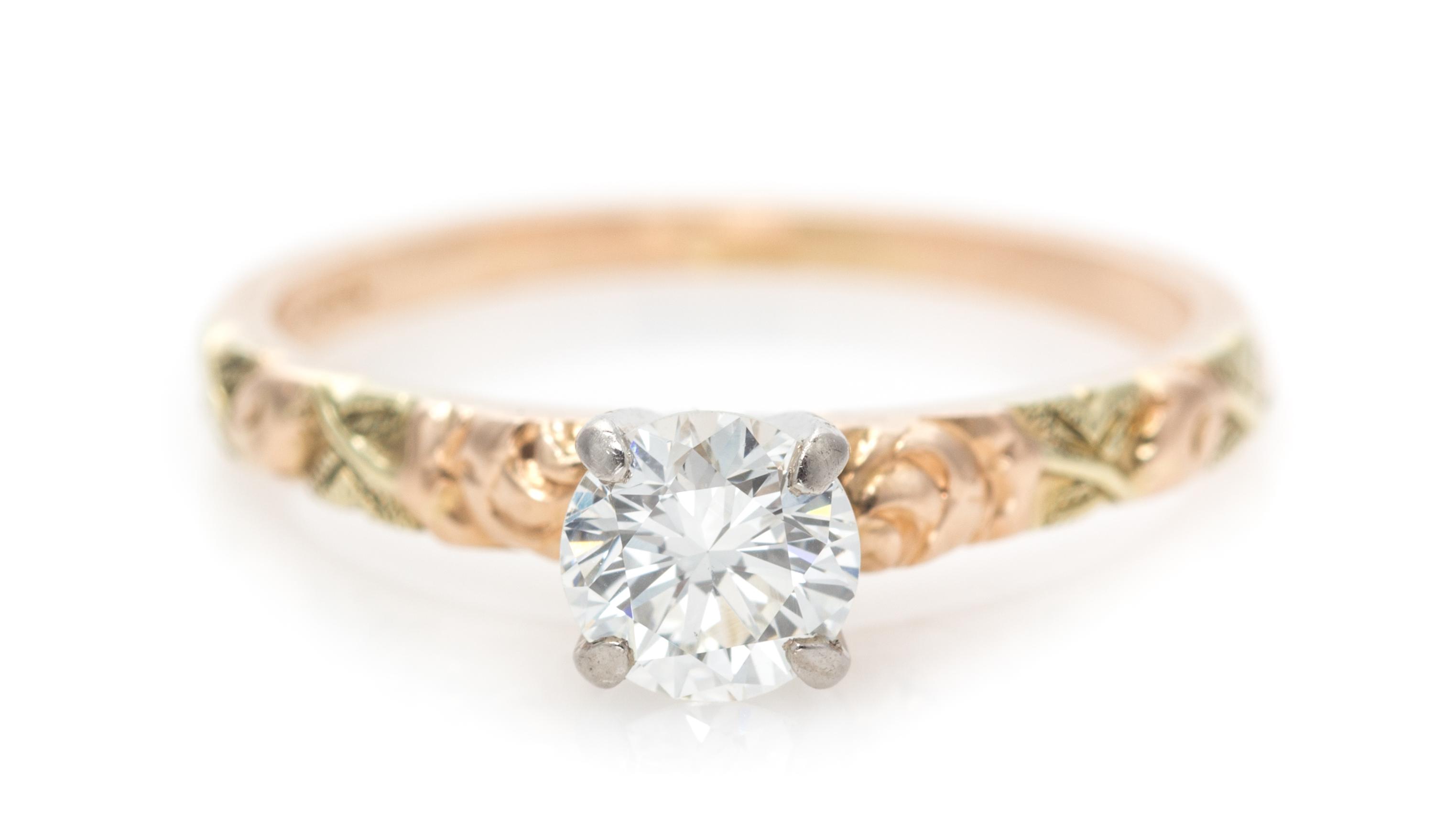 A 14 Rose Gold and Diamond Solitaire Ring, 1.40 dwts.