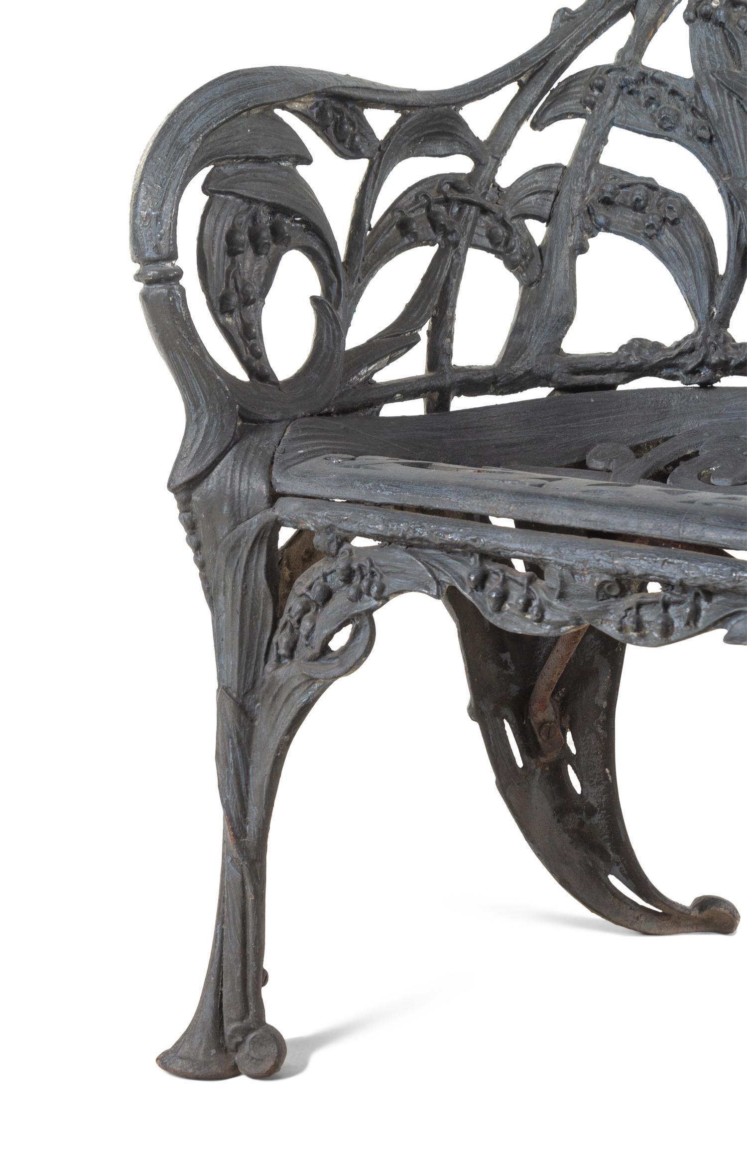 A Set of Four English Cast Iron Garden Chairs