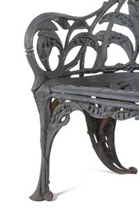 A Set of Four English Cast Iron Garden Chairs