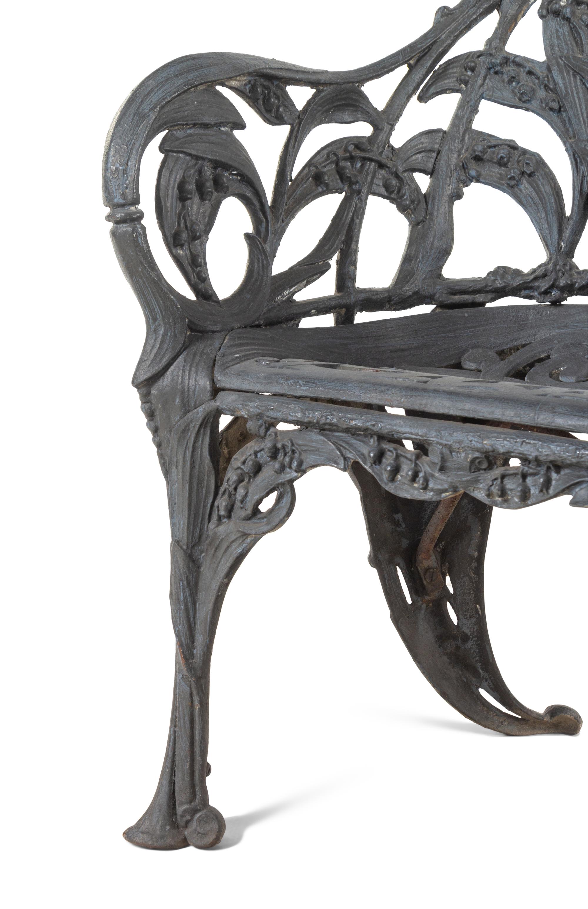 A Set of Four English Cast Iron Garden Chairs
