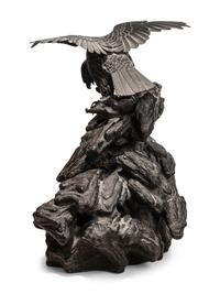 A Japanese Bronze Figural Group of a Hawk Hunting Monkeys