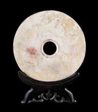 A Chicken Bone Jade Bi Disc Diameter 6 3/4 inches.