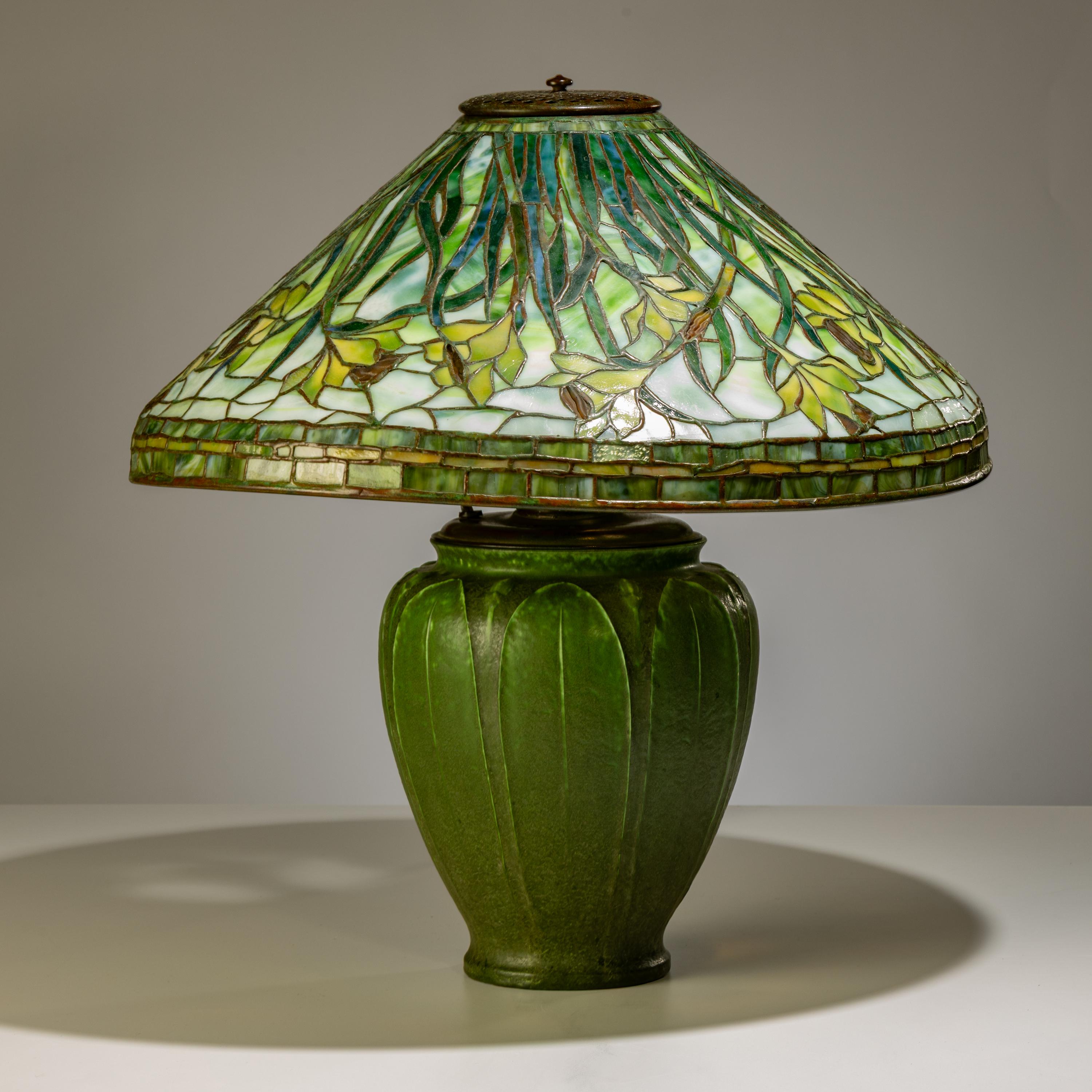 Tiffany Studios New York (American, 1892–1930) — Swirling Daffodil Table Lamp with Grueby Pottery Base