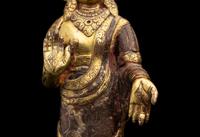 A Nepalese Gilt Bronze Standing Figure of Dipankara