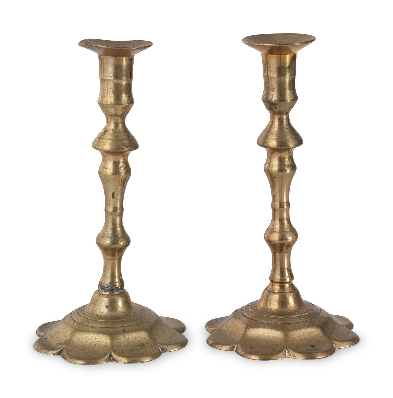 A Pair of English Brass Petal Base Candlesticks