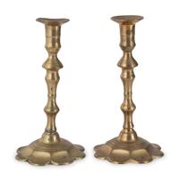 A Pair of English Brass Petal Base Candlesticks