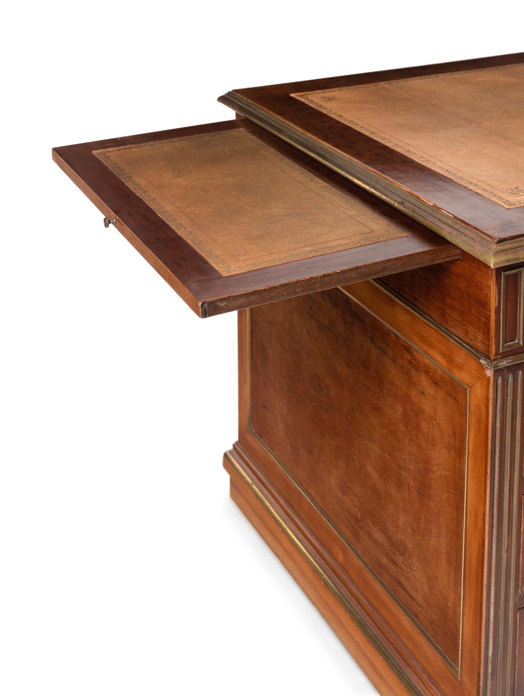 A Directoire Style Brass Mounted Mahogany Pedestal Desk