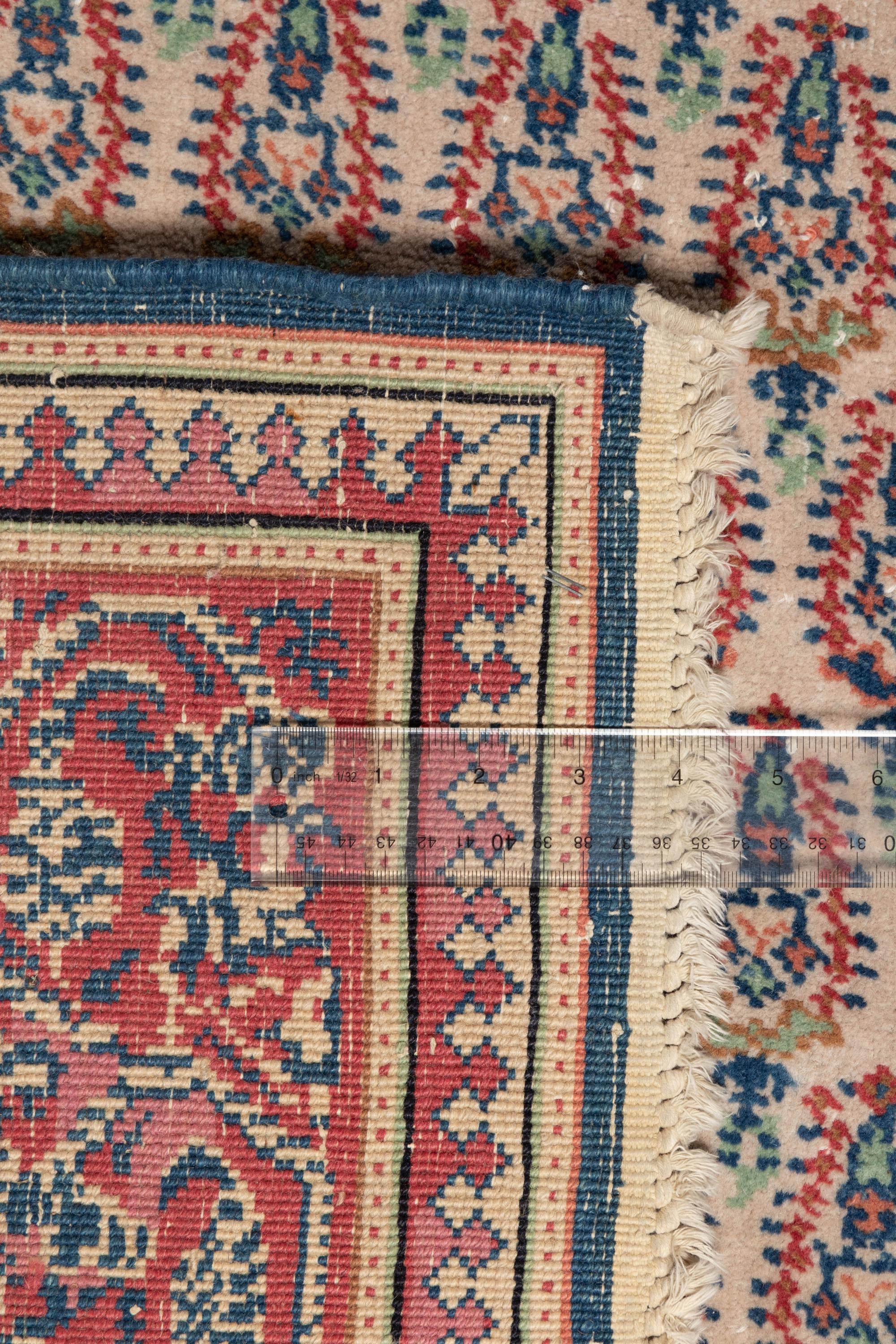 A Persian Boteh Design Wool Rug