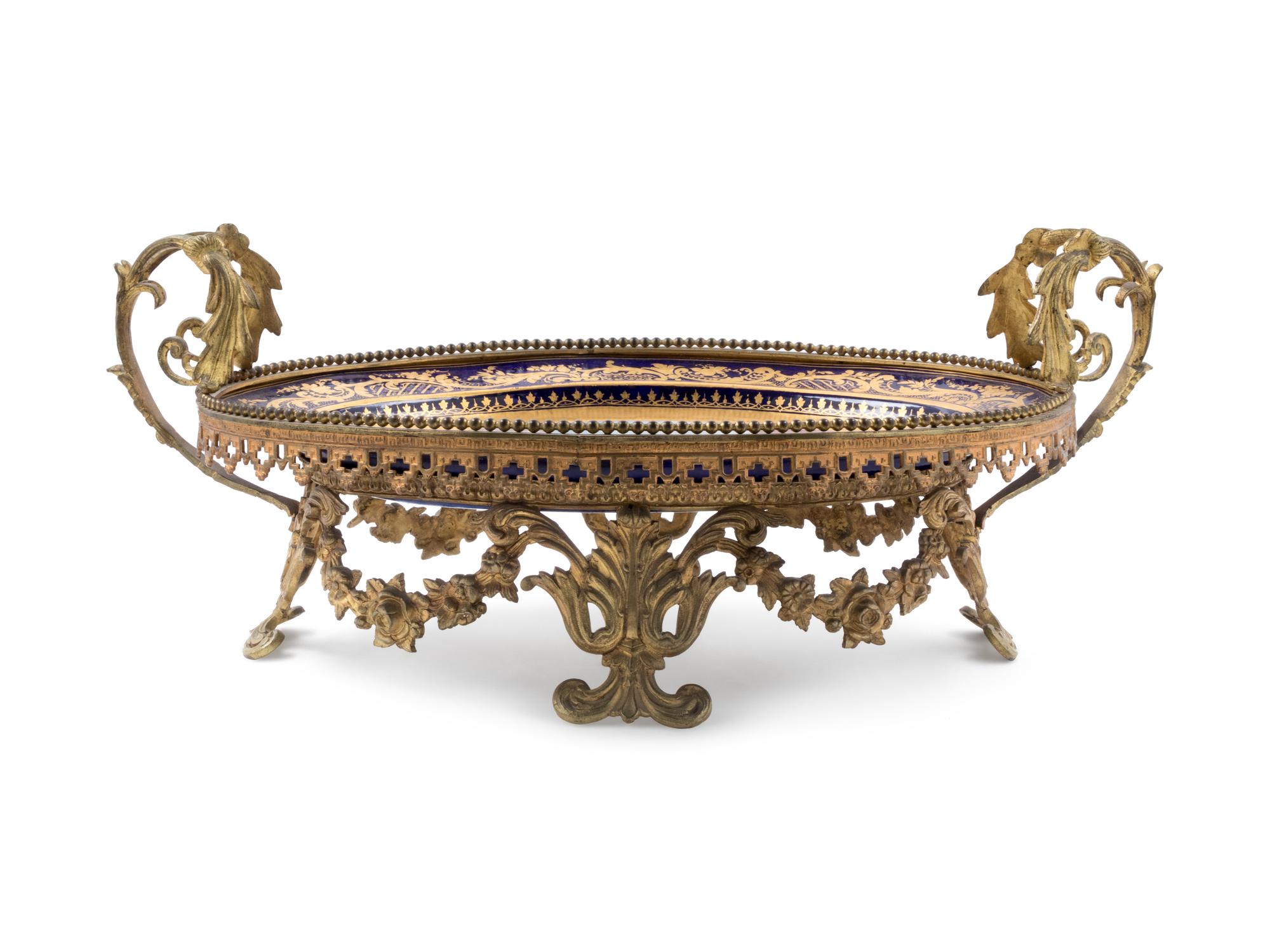 A Sèvres Style Gilt Metal Mounted Painted and Parcel Gilt Porcelain Center Bowl
