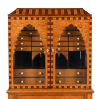 A German or Dutch Bird's Eye Maple and Rosewood Collector's Cabinet on Stand