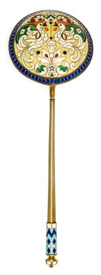 A Russian Silver-Gilt and Enamel Serving Spoon, Mark of 9th Artel, Moscow, early 20th century, having an enameled finial surmounting a