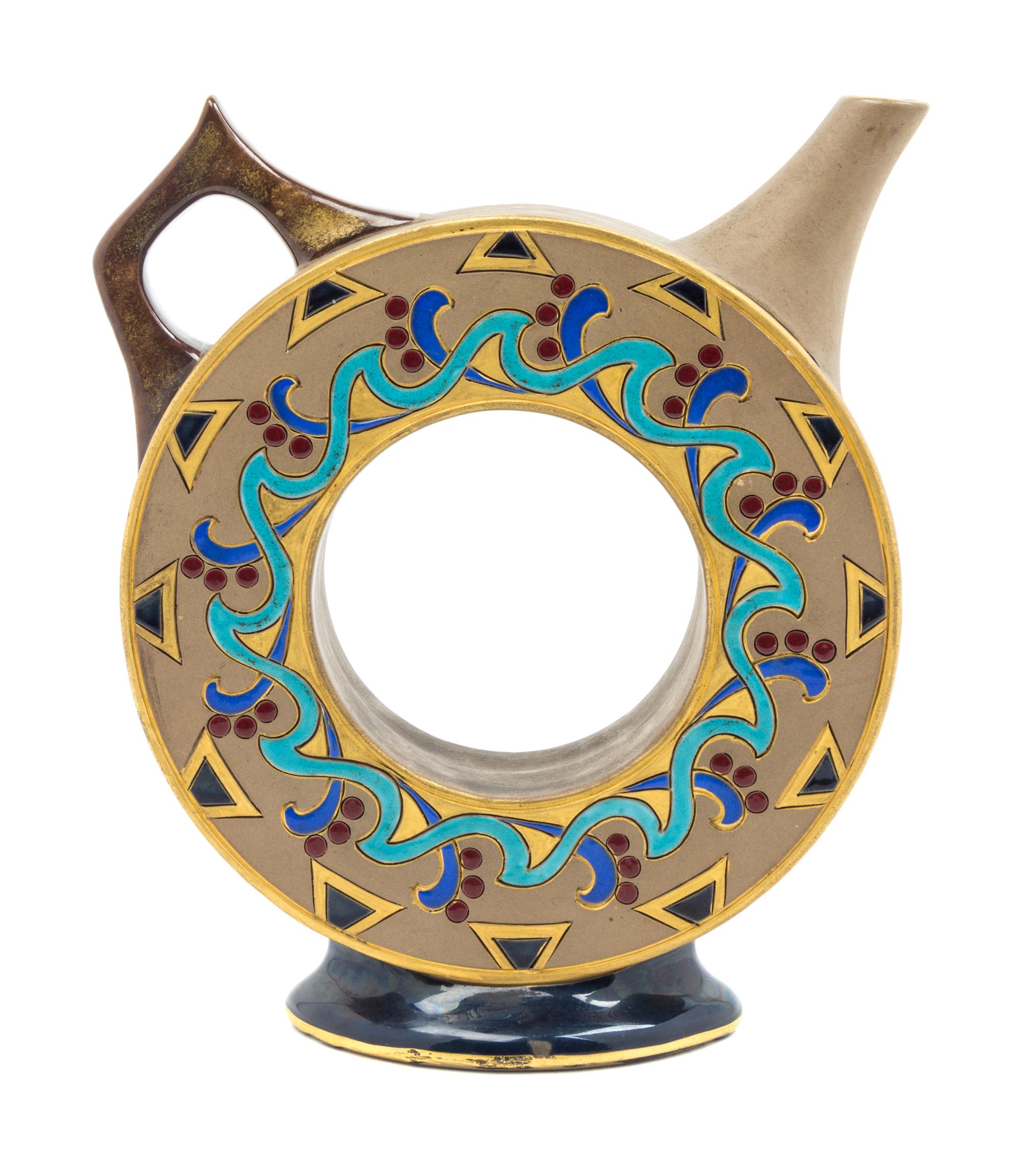 A Sarreguemines Ceramic Pitcher Height 8 3/8 inches.