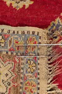 An Oushak Wool Rug