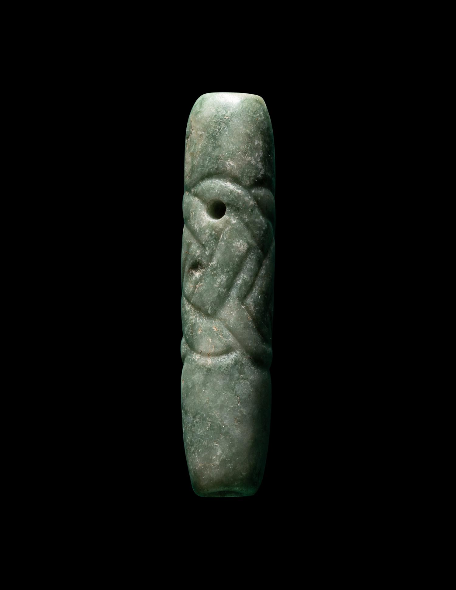 A Maya Jade Glyph Pendant