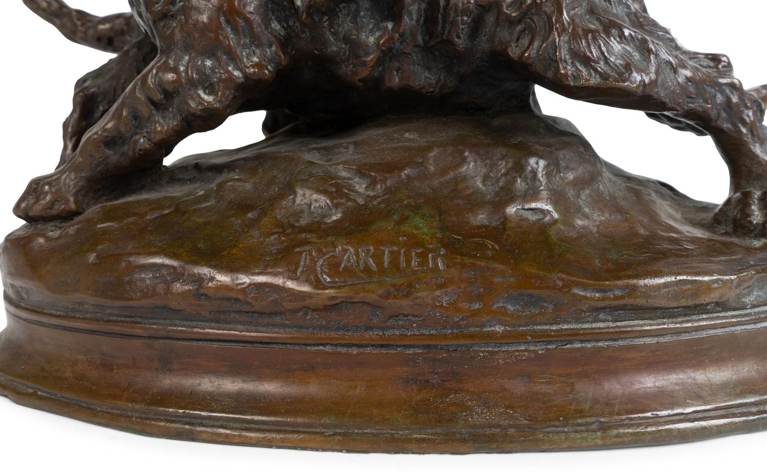 A French Patinated Bronze Group of Dogs — CAST AFTER A MODEL BY THOMAS FRANCOIS CARTIER (FRENCH, 1879-1943)