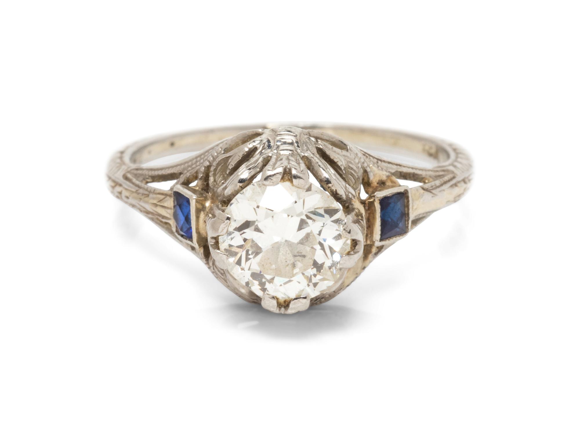 An 18 Karat White Gold, Diamond and Synthetic Sapphire Ring,