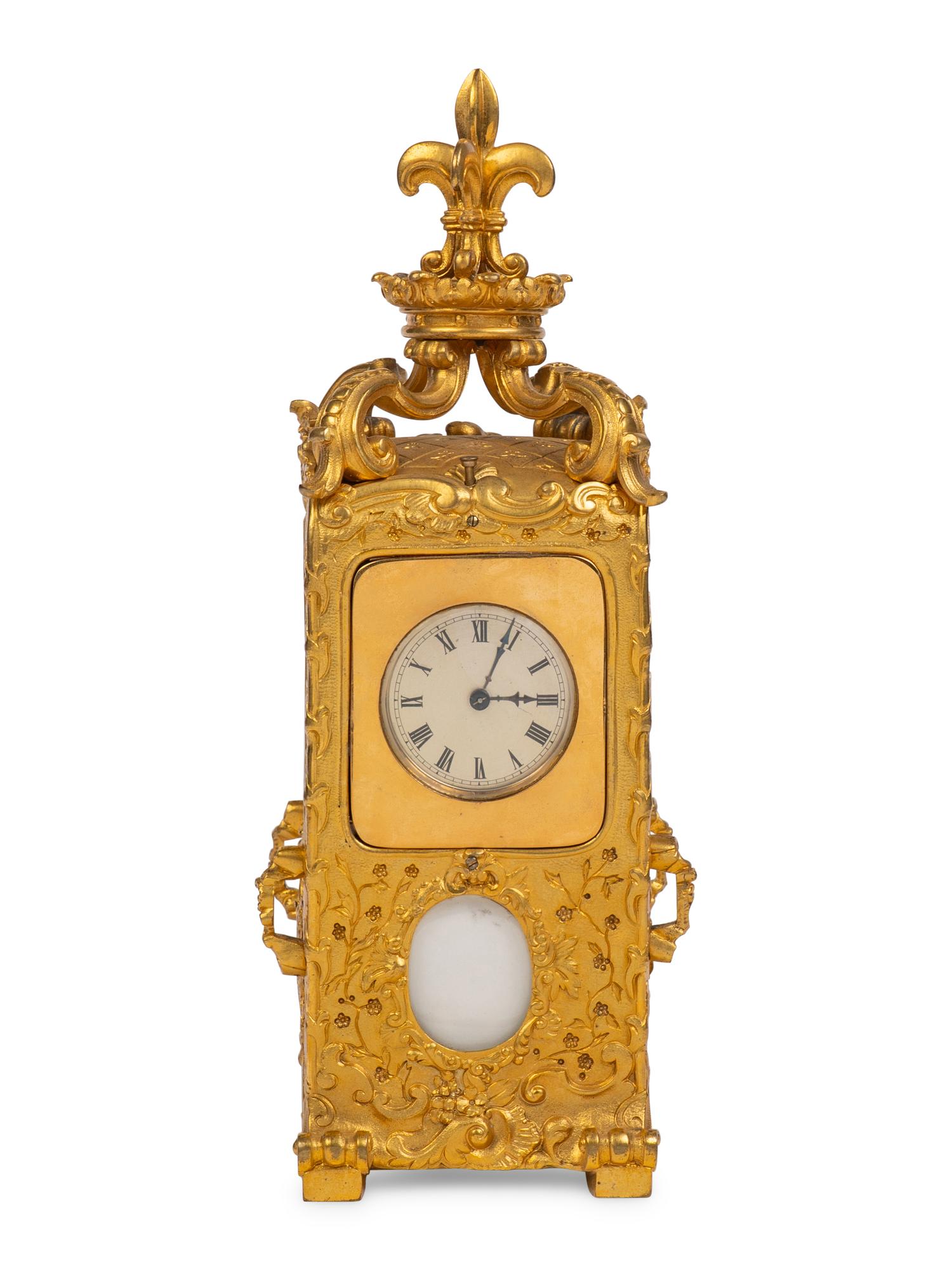 A French Gilt-Bronze Hour Repeater Carriage Clock in the Form of a Sedan Chair