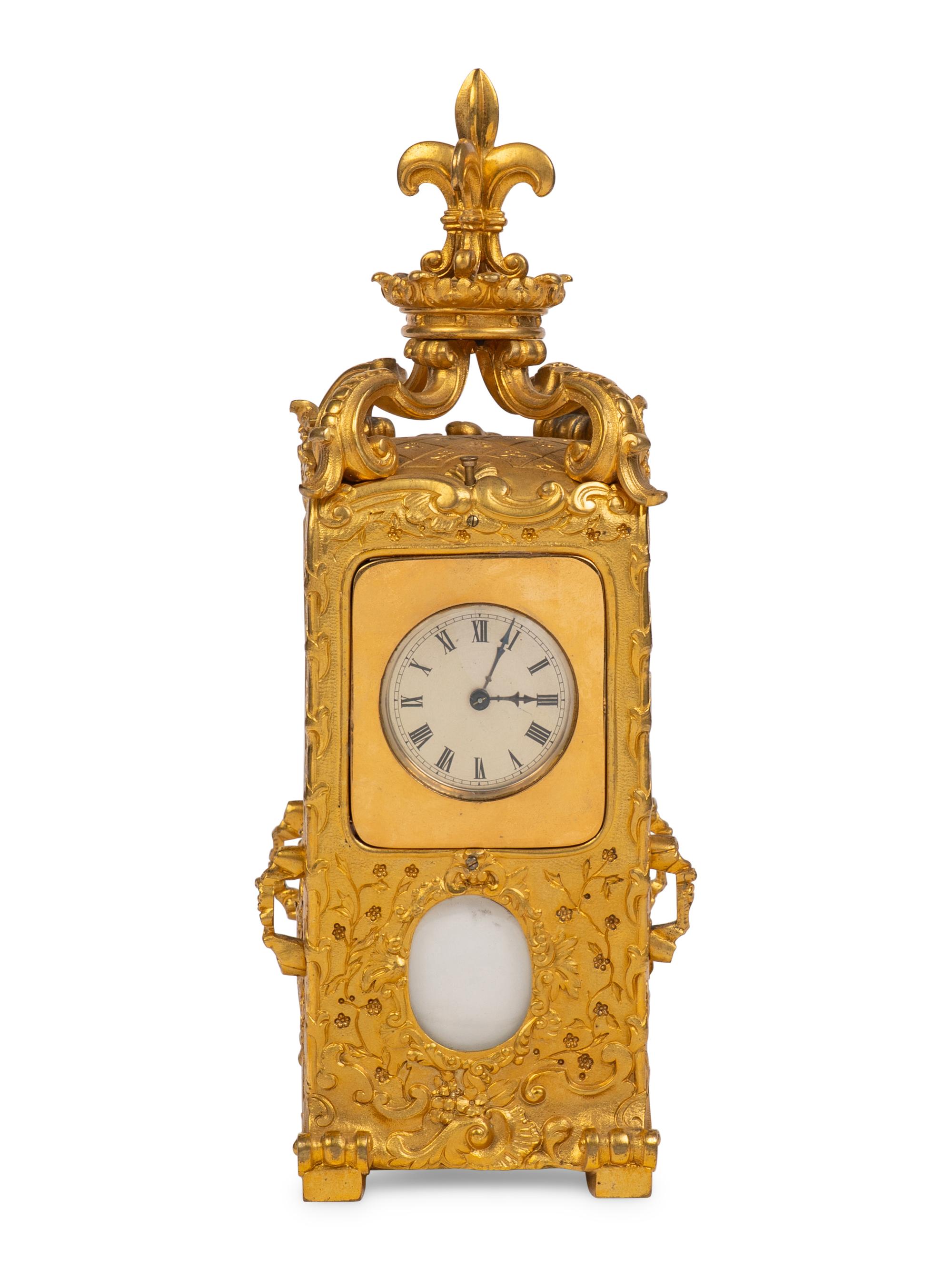 A French Gilt-Bronze Hour Repeater Carriage Clock in the Form of a Sedan Chair