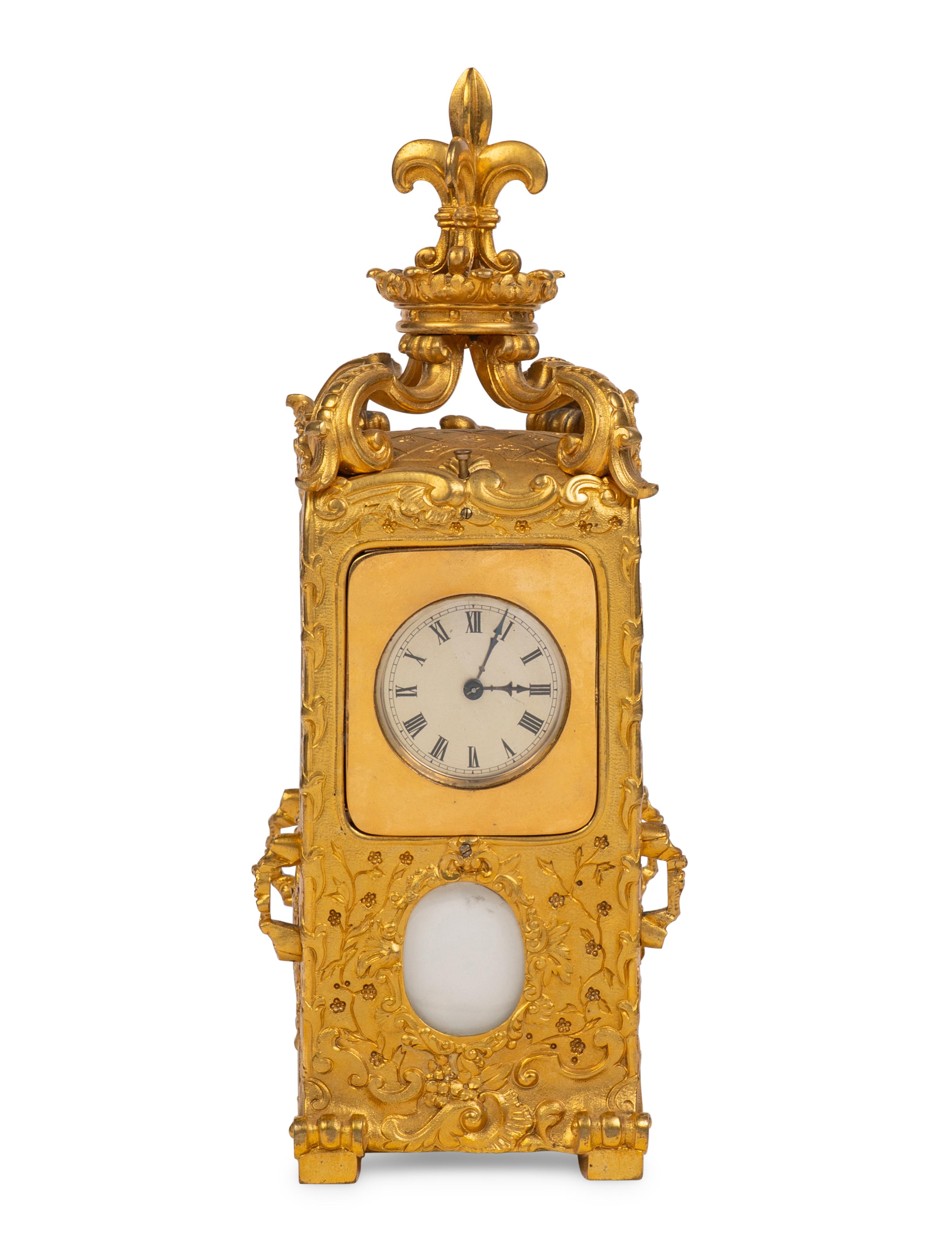 A French Gilt-Bronze Hour Repeater Carriage Clock in the Form of a Sedan Chair