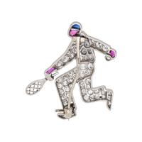 AUSTRIAN, ART DECO, DIAMOND, RUBY AND SAPPHIRE TENNIS PLAYER BROOCH