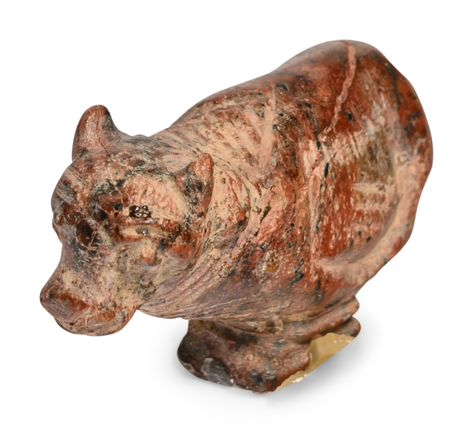 An Egyptian Red Jasper Trussed Cow