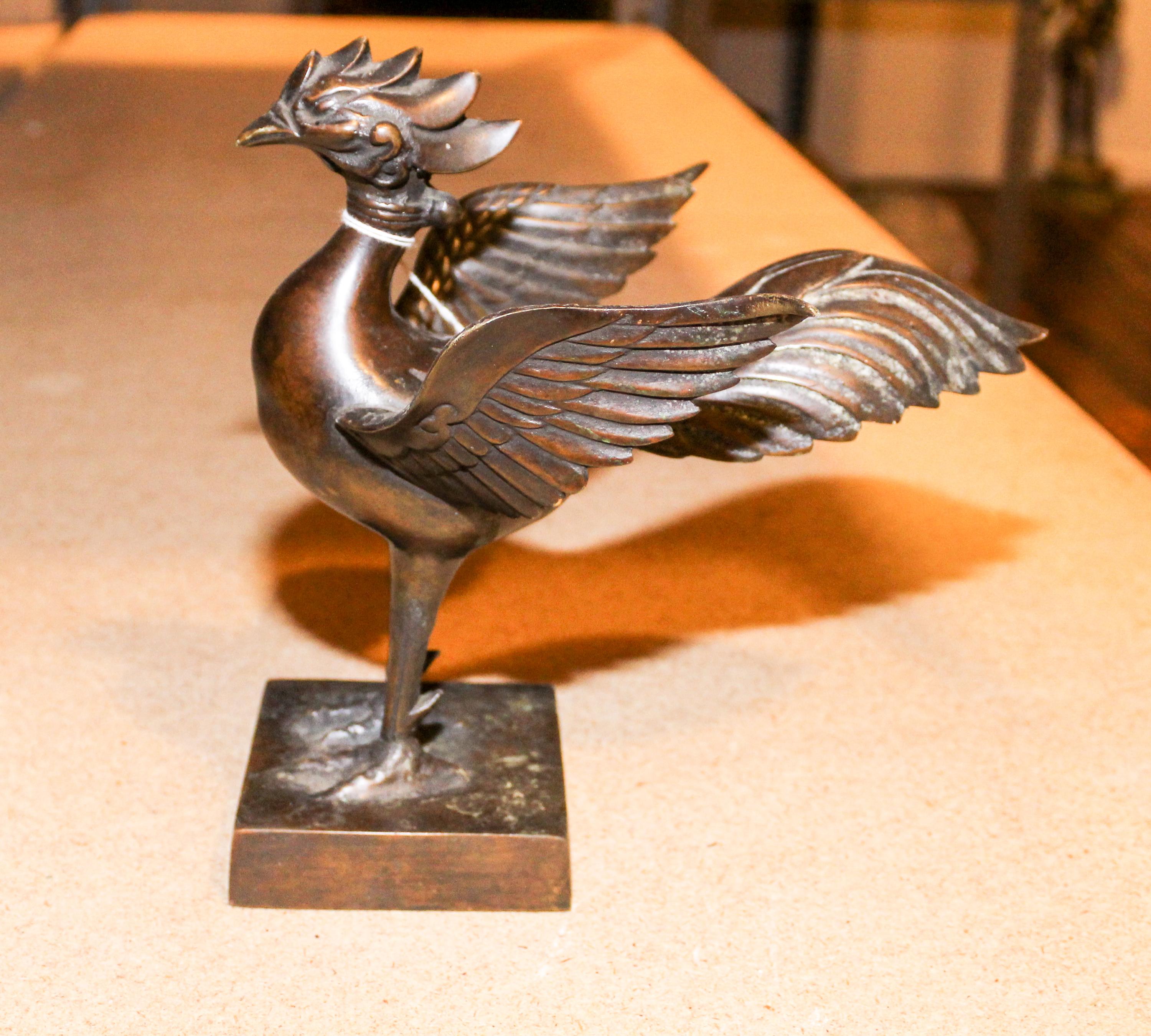 A Southeast Asian Bronze Model of a Bird. Height 8 1/2 inches.