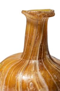 A Roman Marbled Yellow Glass Bottle