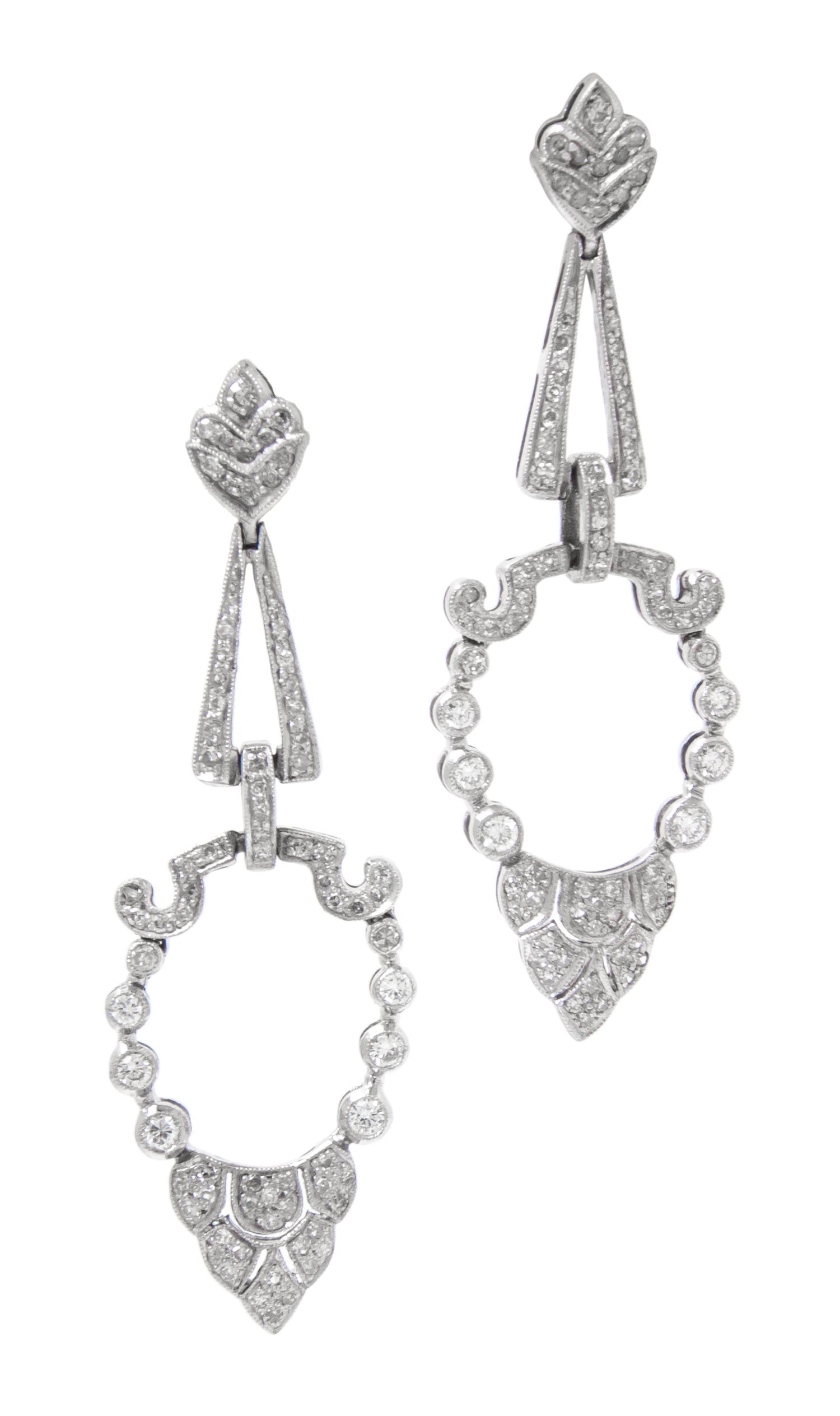A Pair of Platinum and Diamond Drop Earrings, 5.80 dwts.
