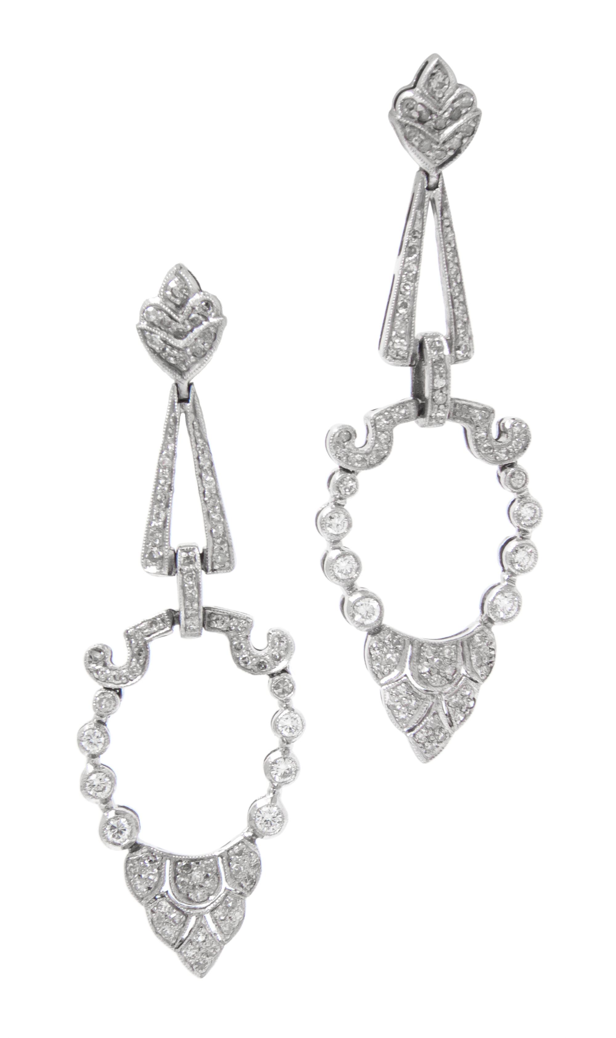 A Pair of Platinum and Diamond Drop Earrings, 5.80 dwts.