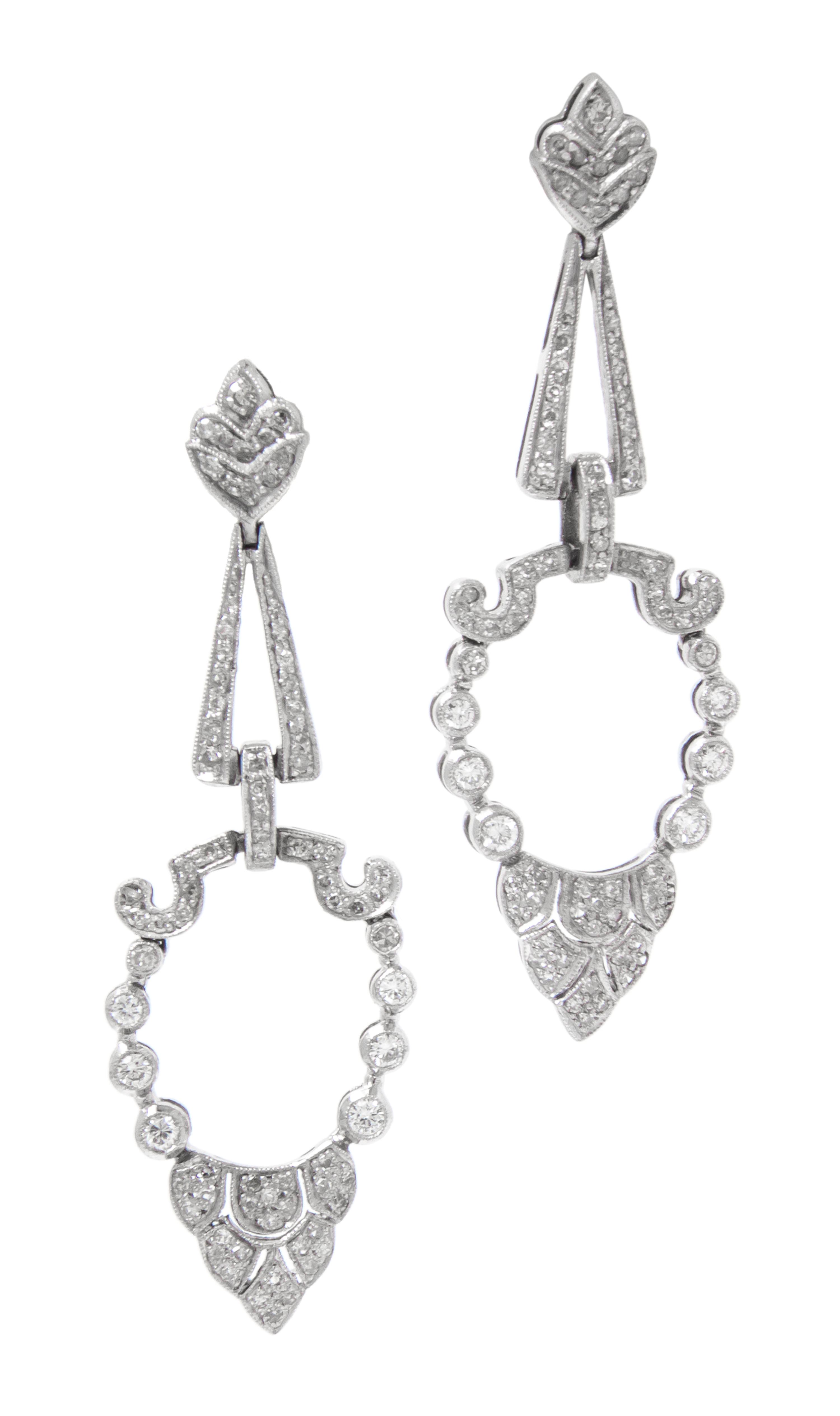 A Pair of Platinum and Diamond Drop Earrings, 5.80 dwts.
