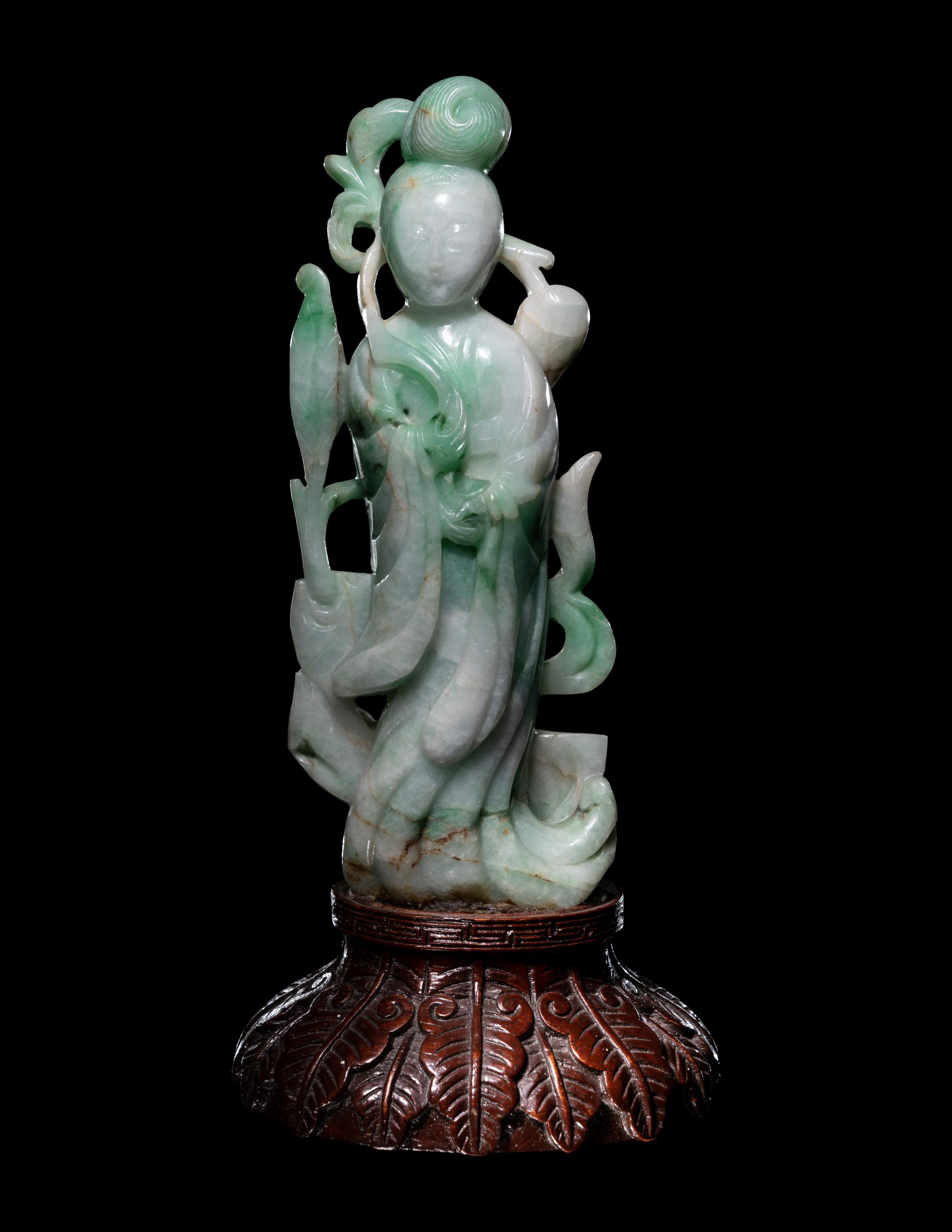 A Chinese Apple Green and Celadon Figure of Female Immortal
