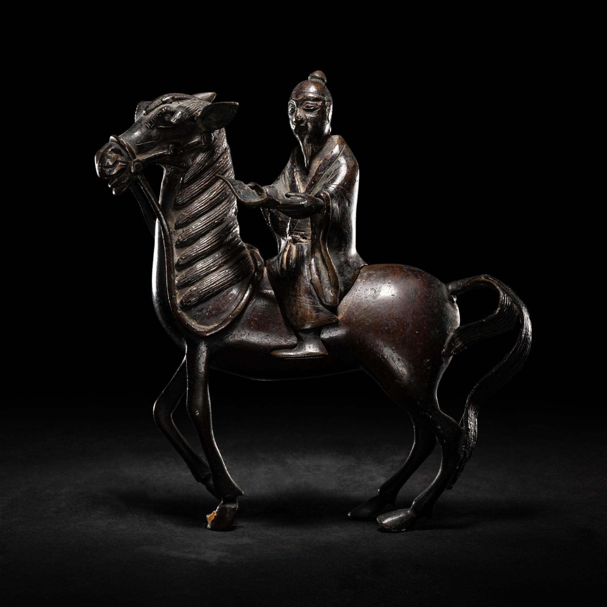 A Chinese Bronze Figural Form Incense Burner