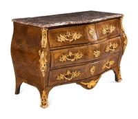 A Louis XV Gilt Bronze Mounted Tulipwood Commode