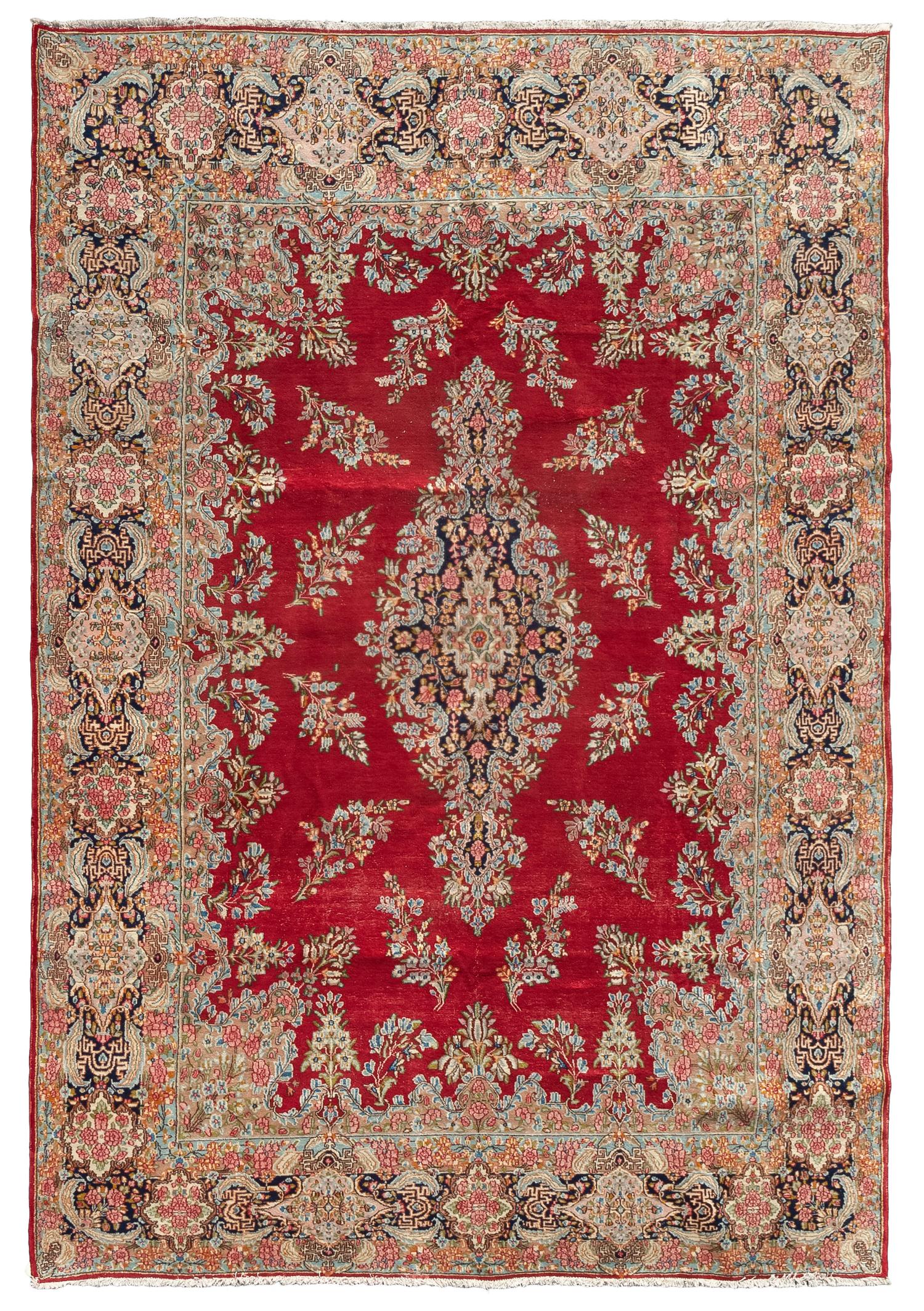 A Kirman Wool Rug 14 feet x 9 feet 10 inches. — CIRCA 1950s