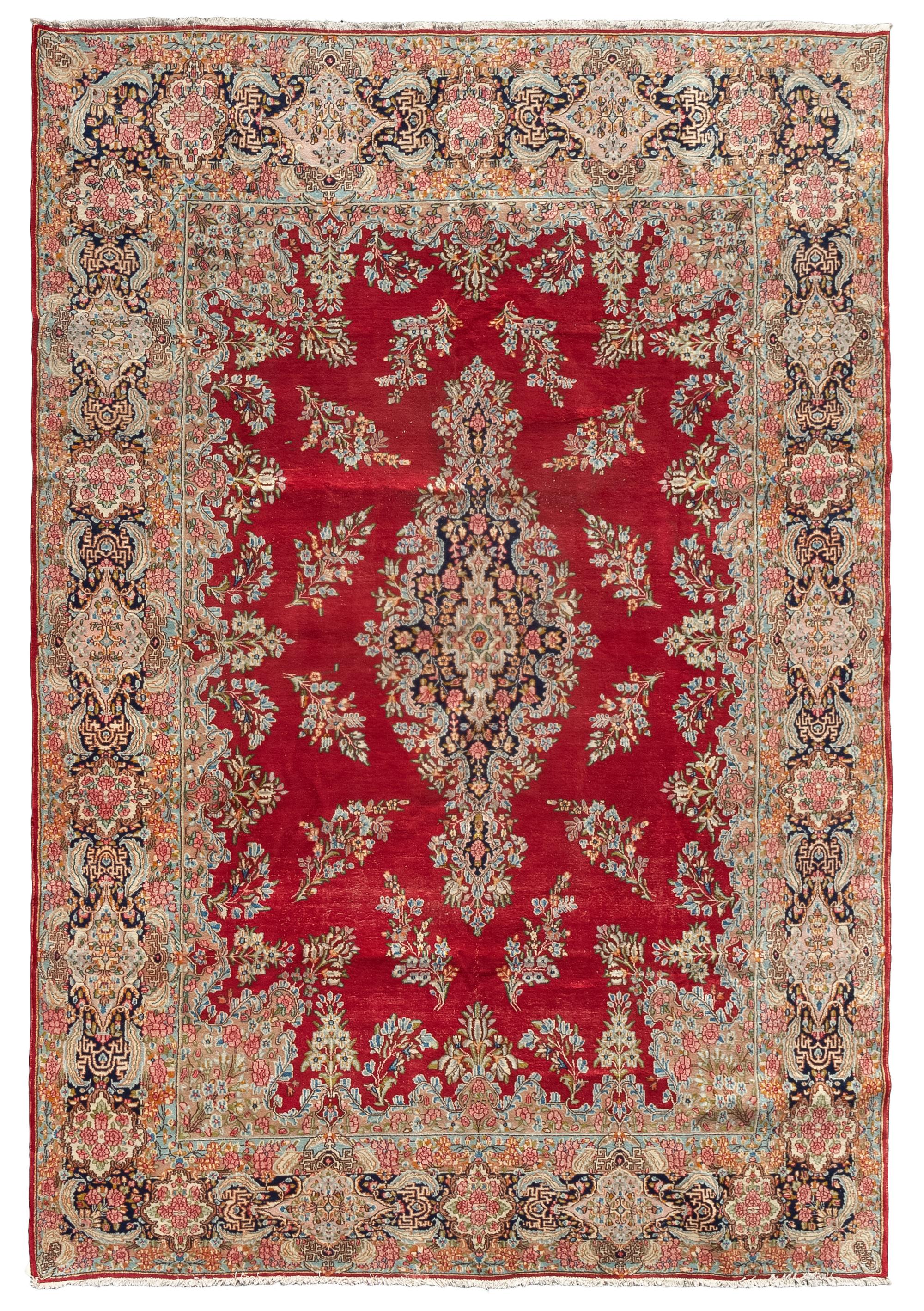 A Kirman Wool Rug 14 feet x 9 feet 10 inches. — CIRCA 1950s