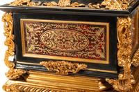 A Pair of Boulle Marquetry and Giltwood Caskets on Giltwood Stands