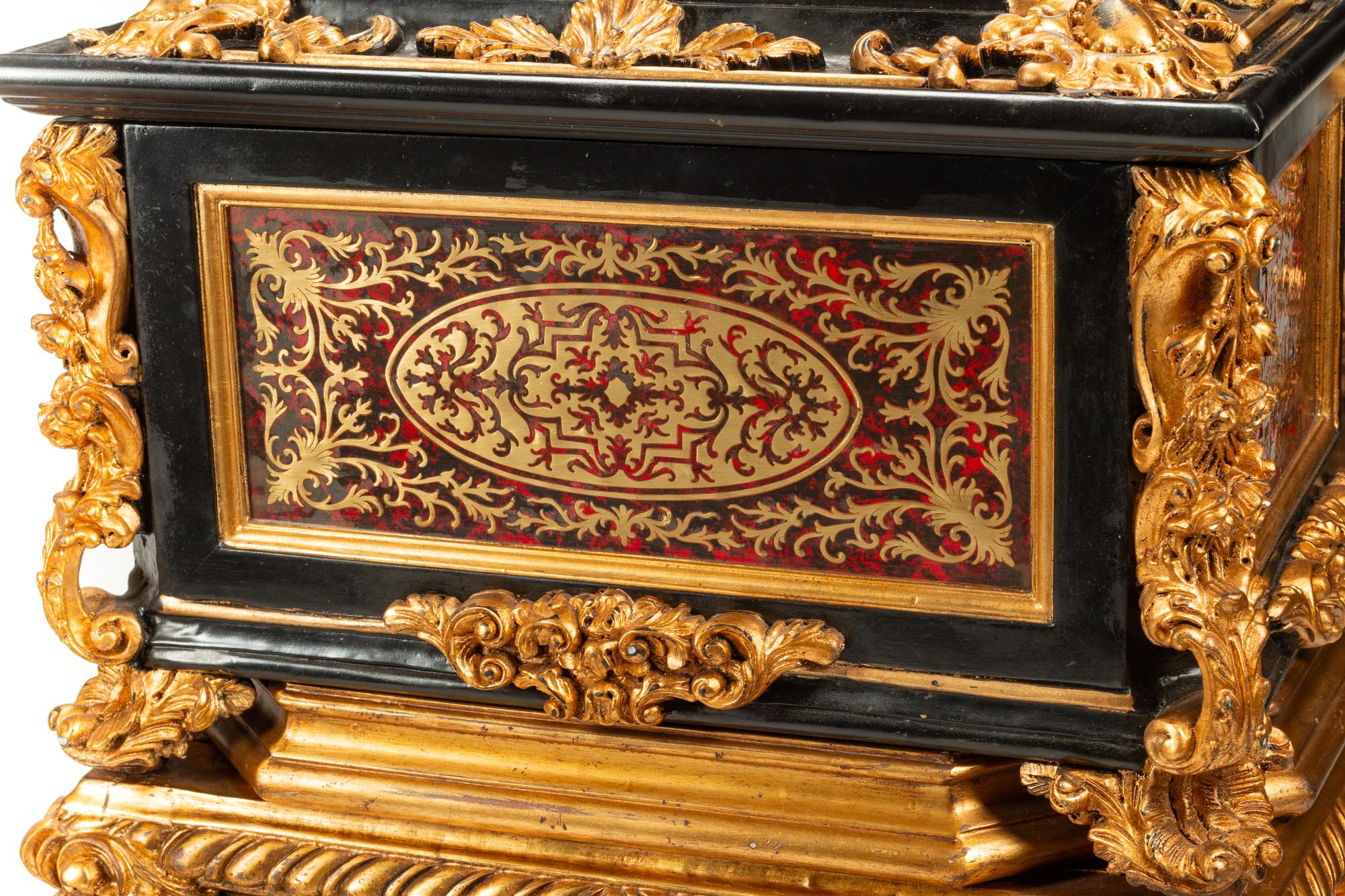 A Pair of Boulle Marquetry and Giltwood Caskets on Giltwood Stands