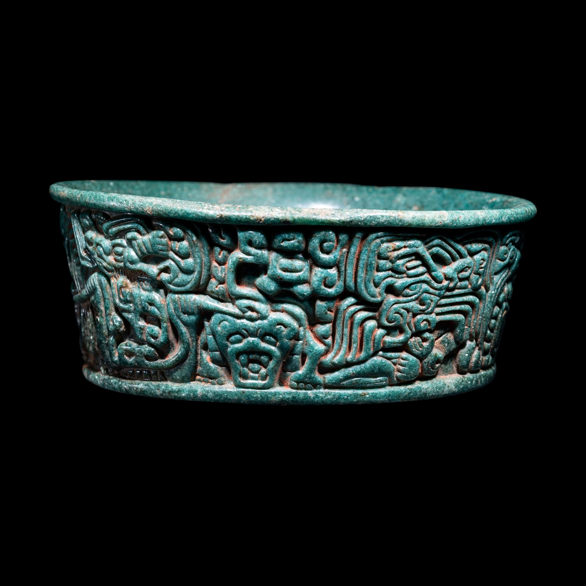 A Maya Green Fuchsite Bowl with Intricate Figures